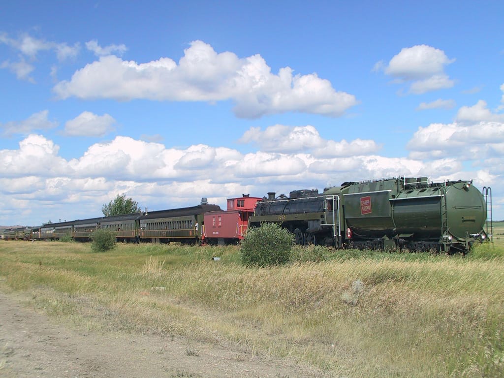 ex-CN 6060 running south to Big Valley, Alberta, 27 July 2002