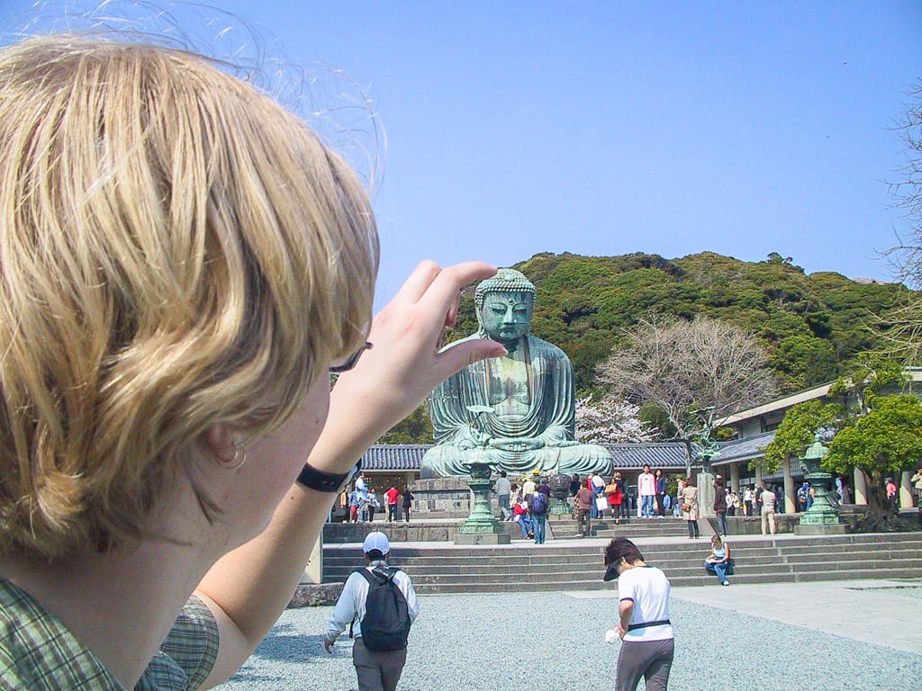 Jen sizes up the Great Buddha, Kamakura, Japan, 7 April 2004